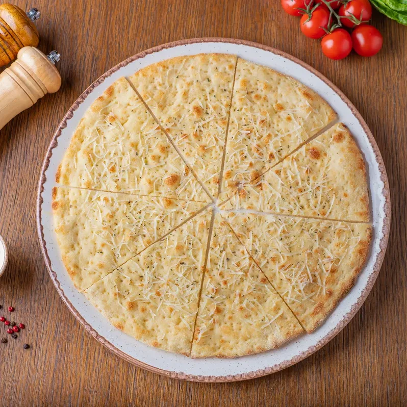 Заказать Фокачча с чесноком и сыром с доставкой | Тренди